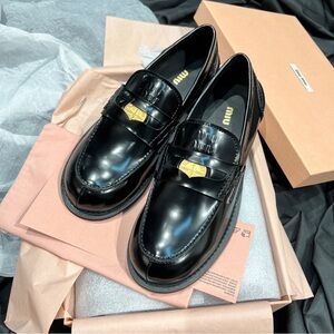 Miu Miu Women’s Black Loafers
